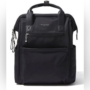 Baggallini SoHo backpack. New with tags. Padded laptop pocket. New with tags.